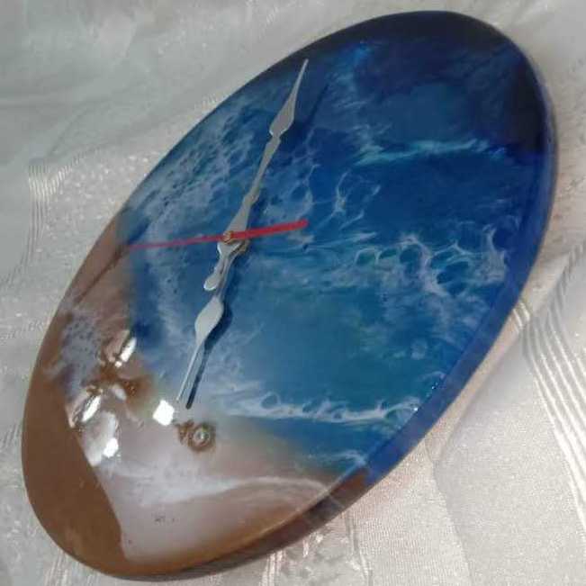 (ساعه حائط (من الخشب و الريزن