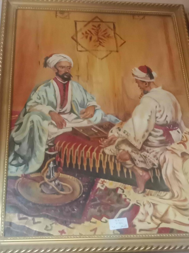 (لاعب الطاوله  (من اعمال المستشرقين